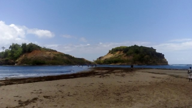 Photo du Tombolo depuis la plage de Sainte Marie
